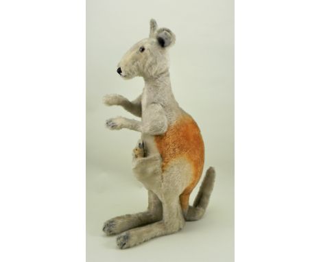 A large Steiff mohair standing Kangaroo and Joey, German 1930s, the tan and rust mohair straw filled Roo with brown glass eye