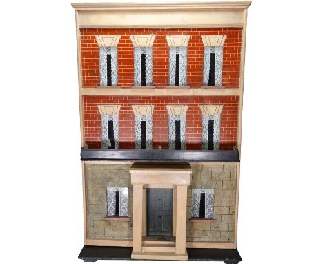 A large furnished Silber &amp; Fleming painted wooden box-back dolls house, German 1880s, the painted stone and red brick faç