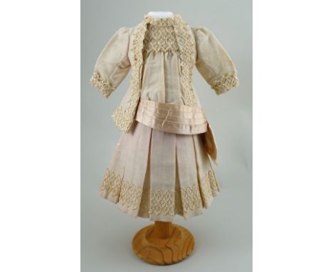 A good original pink/cream dolls outfit for size 8 Bebe, circa 1890, in the Jumeau style, the two piece dress in cream with l