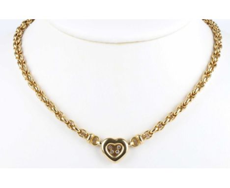 GG 750/000 Gelbgold Herzanhänger und Halskette, Modell Happy Diamonds, Anhänger mit vier Brillanten von insgesamt 0,20 ct, sc