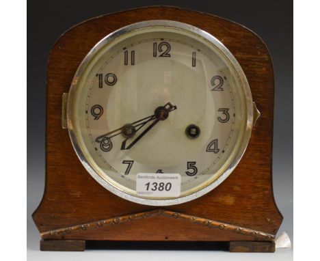 An oak cased mantel clock, Arabic numerals 