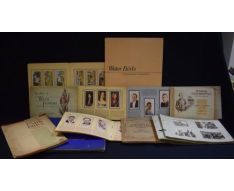 Albums of cigarette cards; etc. (11)