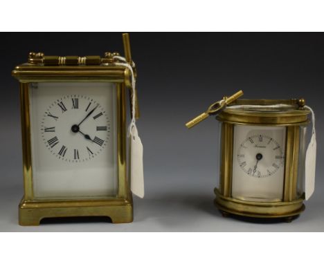 A 20th century carriage clock, white dial, manual movement, platform escapement; another oval, forum (2)