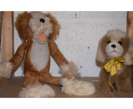 A Stieff stuffed toy Drolly Dog, yellow ear tag and button;  another floppy dog (2)