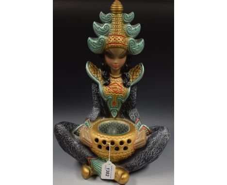 A 1960s kitsch plaster lamp modelled as a Thai girl