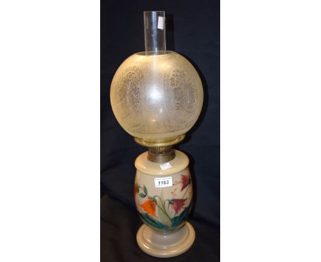 A Victorian fawn milk glass oil lamp, printed with flowers, floral globular shade, c.1880