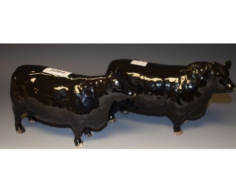 A Beswick model of a Black Bull for the Cattle Society; another similar (2) 