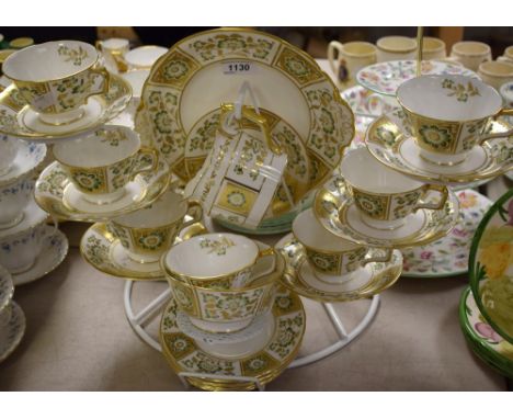 A Royal Crown Derby Green Derby panel pattern tea service inc seven cups and saucers, five side plates, bread plate, milk jug