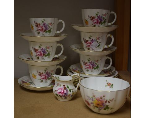 A Royal Crown Derby Posies tea service for six comprising cups and saucers, side plates, sugar bowl and cream jug