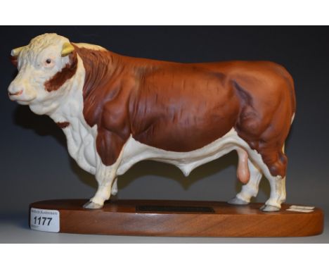 A Beswick connoisseur model Hereford Bull, wooden plinth 