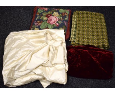 Textiles - a cream silk curtain; a Welsh woollen throw; a red crushed velvet panel; a floral tapestry cushion