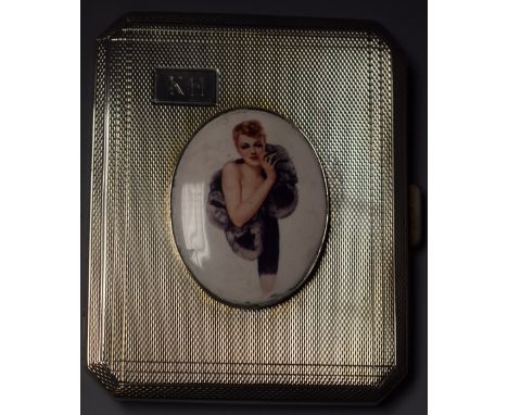 An Elizabeth II silver cigarette case, later applied with a plaque of a scantily clad lady, Turner & Simpson, Birmingham 1961