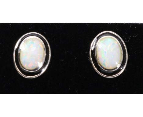 Pair of silver opal stud ear-rings stamped 925   Condition Report   Click here for further images, condition, auction times &