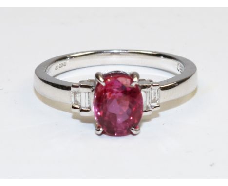 18ct white gold oval pink sapphire and baguette diamond ring hallmarked 18ct    Condition Report   Click here for further ima