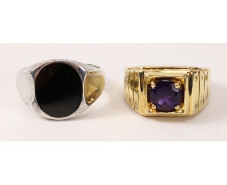 Gentleman's silver and Whitby jet ring and a silver gilt and amethyst ring both stamped 925   Condition Report   Click here f