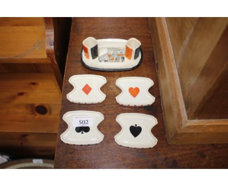A Royal Doulton playing card decorated Hors D'oeuvre set