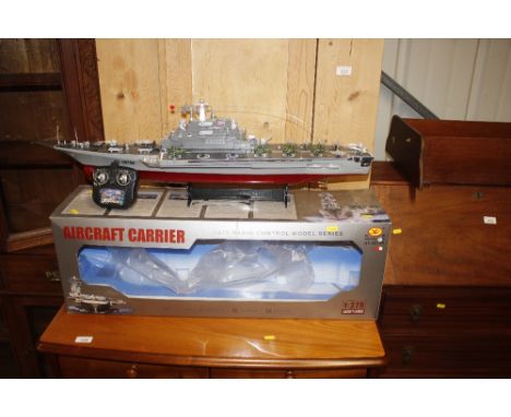 A radio controlled model of an aircraft carrier 