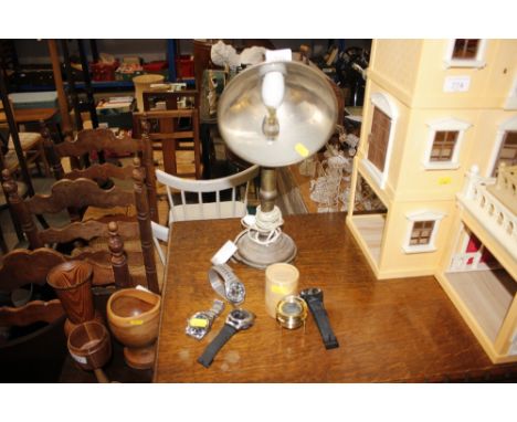A brass lamp sold as collector's item; four wrist watches - one AF and a Captain Cooke magnifier 