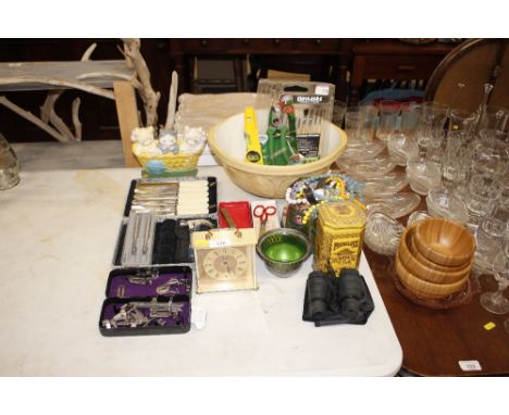 A quantity of costume jewellery; a large mixing bowl; cutlery; mantel clock; pens etc