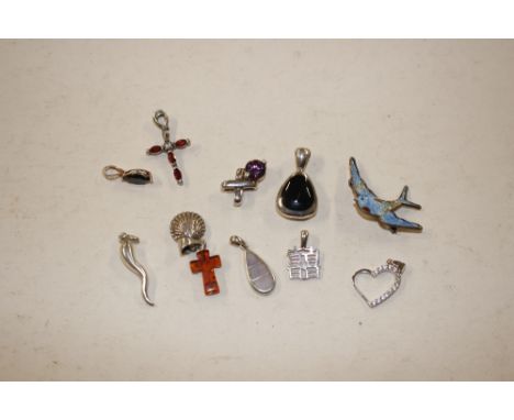 A collection of 925 marked items to include enamel work swallow, an amber cross and others 