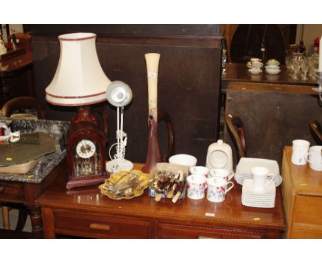 A large decorative tinted glass vase; table lamp and shade; mantel clock; various plated cutlery; teaware etc.