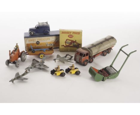 A Dinky Toys 751 Lawn Mower, 322 Disc Harrow, in original boxes, G-E, boxes F-G, 301 Field Marshall, 621 3-Ton Army Wagon, 62