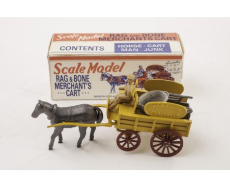 A Debo Toys Rag & Bone Merchants Cart, scale model reproduction of the early Lesney toy, in yellow with horse, driver and sev