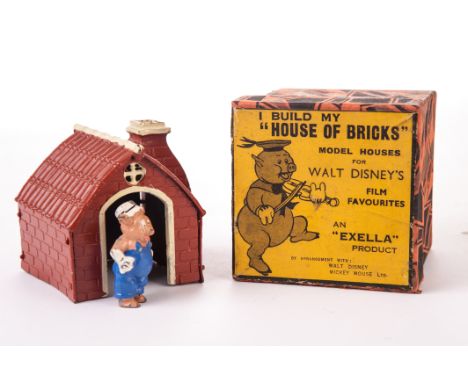 A rare Exella boxed 'House of Bricks' from Walt Disney Three Little Pigs, with pig carrying trowel, generally VG box complete