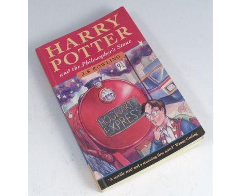 Harry Potter and the Philosopher’s Stone, by J.K Rowling, first edition, paperback, with signed presentation inscription, 199