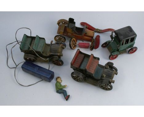 Four&nbsp;TM Modern Toys of Japan tin plate clockwork toy cars, various models to include Old Timer, one with a remote contro