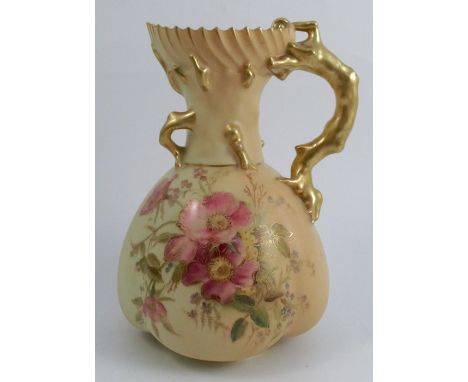 A Royal Worcester blush ivory jug, with gilt coral moulding to the neck and handle, decorated with flowers to the quartered b