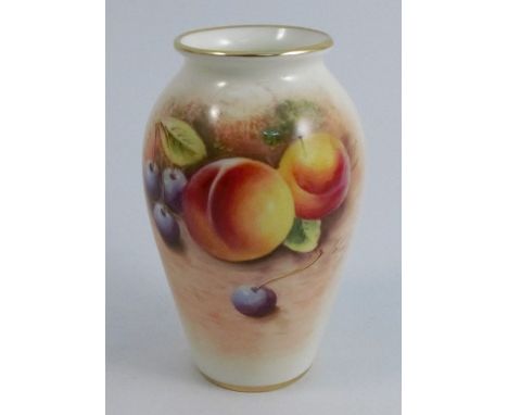 A Royal Worcester vase, the front decorated with fruit to a mossy background by Roberts, shape number G461, dated 1954, heigh