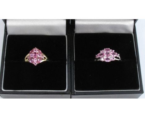 A 9 carat gold pink stone cluster ring, finger size N, together with another white gold set example; 4.8g gross