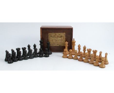 A Jaques &amp; Son Staunton chess set, in black and natural wood, height of king 3ins, together with a mahogany box with slid