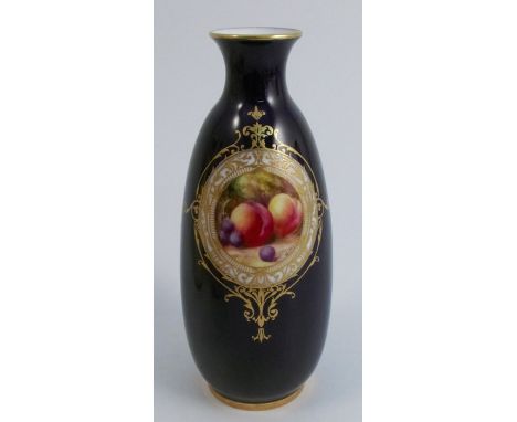 A Royal Worcester vase, decorated with a reserve panel of fruit to a mossy background, indistinctly signed, with a gilt frame