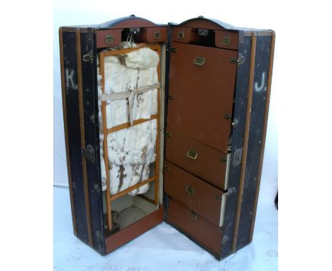 A Koffer Winkler Wien travelling trunk. the interior fitted with hanging space, drawers etc, together with a quantity of vint