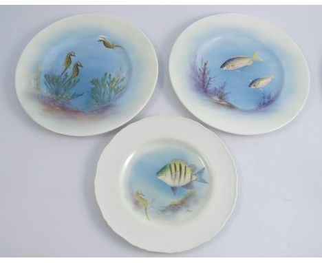 A Royal Worcester plate, decorated with seahorses and plants by Platt, diameter 10.5ins, together with another Royal Worceste
