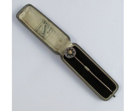 A Victorian silver, gold and enamel diamond set stickpin, cased