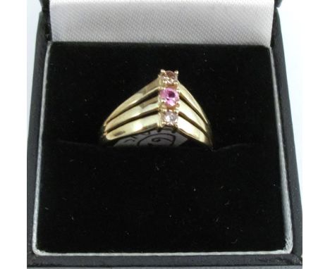 A 9 carat gold diamond and pink stone ring, finger size N, 2.1g gross