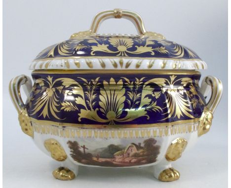 A 19th century Bloor Derby tureen and cover, the cover decorated with a View near Derby to a blue and gilt border, the base d