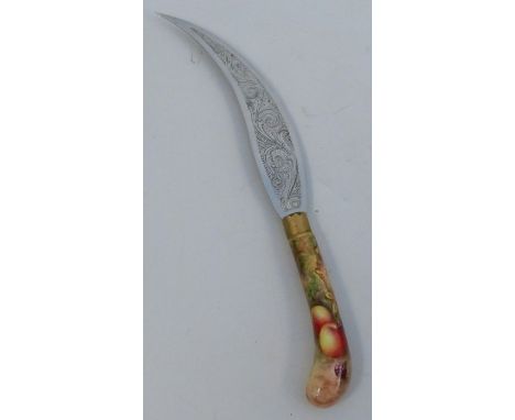 A Royal Worcester knife handle, decorated all over with fruit to a mossy background by E Townsend, with engraved curved blade