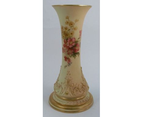 A Royal Worcester blush ivory vase, of trumpet form, decorated with floral sprays, the lower section with moulded decoration,