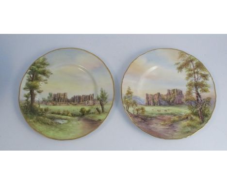Two Royal Worcester plates, decorated with titled views of Kenilworth Castle and Oystermouth Castle by P Love and another art