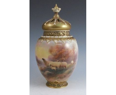 A Royal Worcester crown top covered vase, the body decorated to the front with sheep in a hilly landscape adn to the reverse 