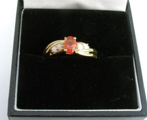 A 9 carat gold fire opal and opal ring, finger size N, 2.3g gross