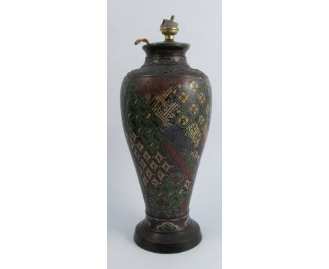 An Oriental cloisonne lamp base, of baluster form, decorated with a repeating pattern, marked Made in Japan, height 14ins
