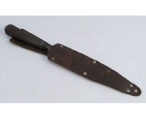 A Boer War or WW1 fighting dagger, with leather scabbard, length including handle 11ins