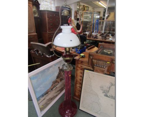 CRANBERRY GLASS OIL LAMP, hanging oil lamp with milk glass shade and matched cranberry glass stand, 60" height 