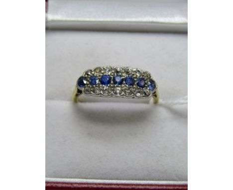 18CT YELLOW GOLD SAPPHIRE &amp; DIAMOND CLUSTER RING, central row of pale blue sapphires set between 2 rows of well matched o