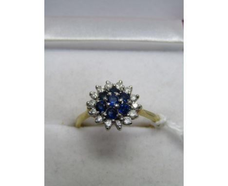 18CT YELLOW GOLD SAPPHIRE &amp; DIAMOND CLUSTER RING, 7 sapphires of good colour surrounded by brilliant cut diamonds in 18ct